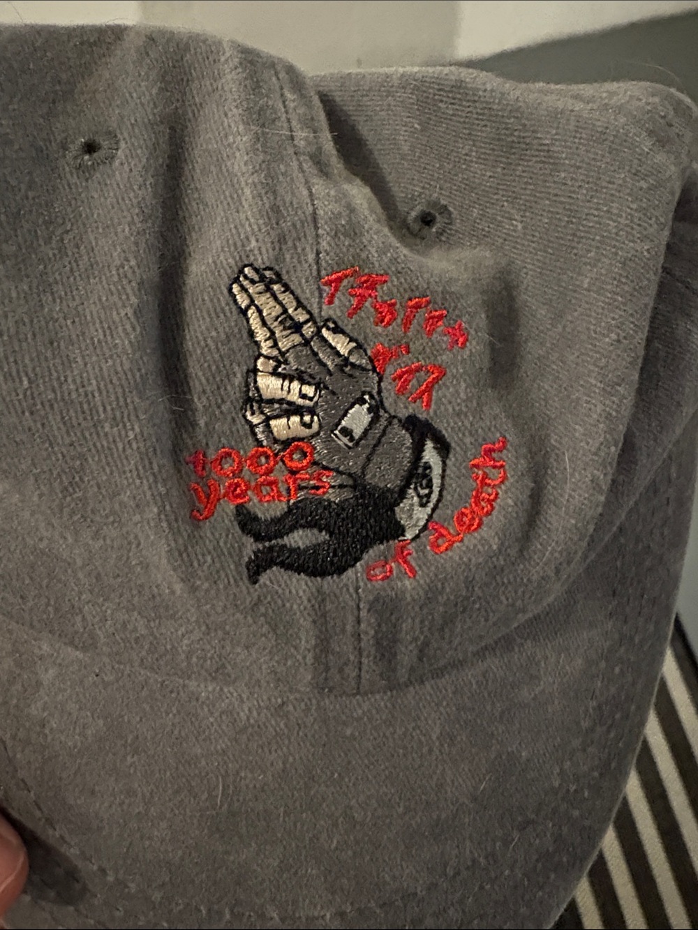 Gray Embroidered Praying Hand Cap with Red Accent